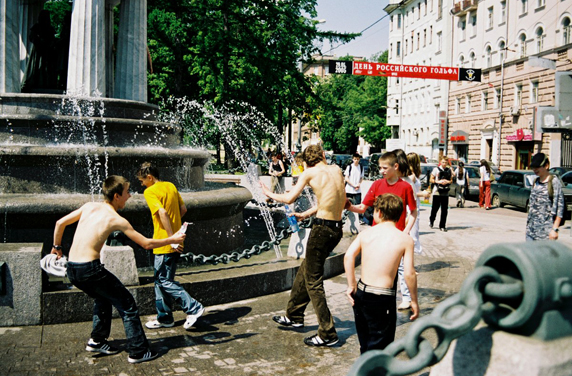 Russian Boys Playing in Water by Fountain
